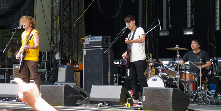 Bassist Stephen Pope, lead singer/guitarist Nathan Williams and drummer Jacob Cooper peform at Sasquatch music festival. Photo courtesy of Wikipedia.