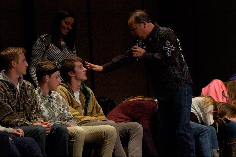 Luke Biggs(far left) and Dylan Devaney(left) watch as Mark Yuzuik hypnotizes Milo Simpson.