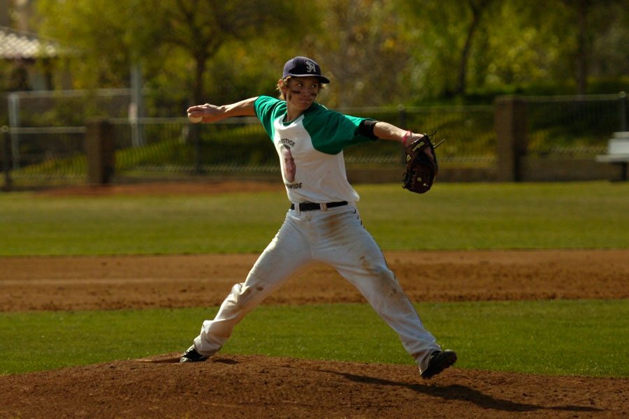 Josh Robinson(12) pitches to his teammate on the Smack a Pitch team in a friendly baseball scrimage.