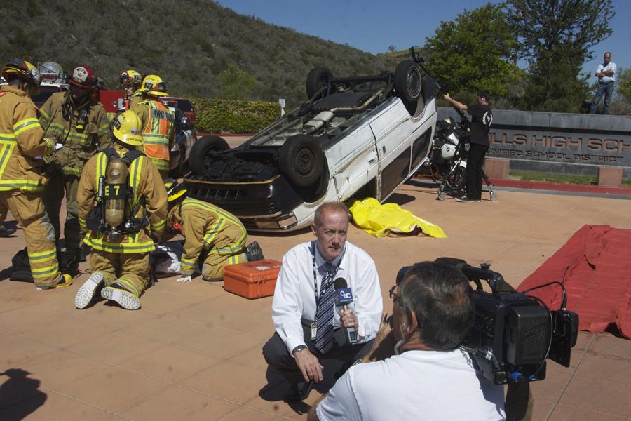 A reporter from CNC reports on the mock crash that took place at SJHHS for the Every 15 Minutes program.