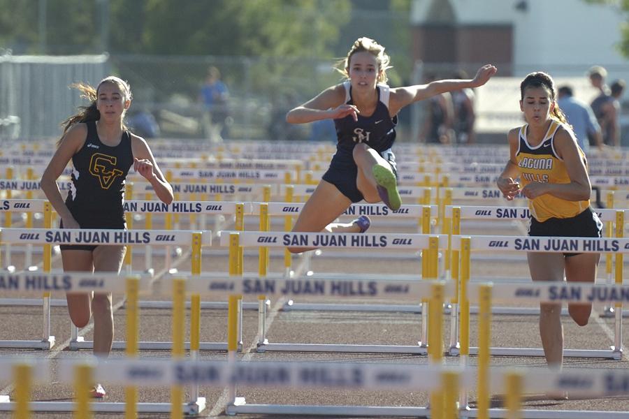 Paige Donaldson wins the Varsity 100 Meter Hurdles with a time of 15.82 seconds at the Sea View League Finals.