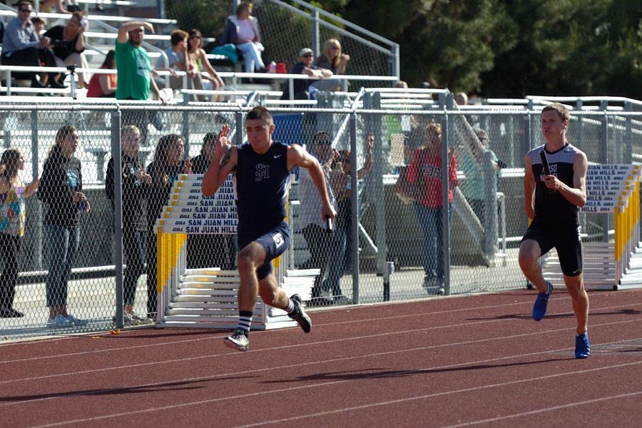 Spencer Danner(12) anchors the 4x100 relay team. The relay team of Kyle Estrada(12), Austin Boone(10), Connor Meech(11), and Danner placed first at Sea View League Finals.