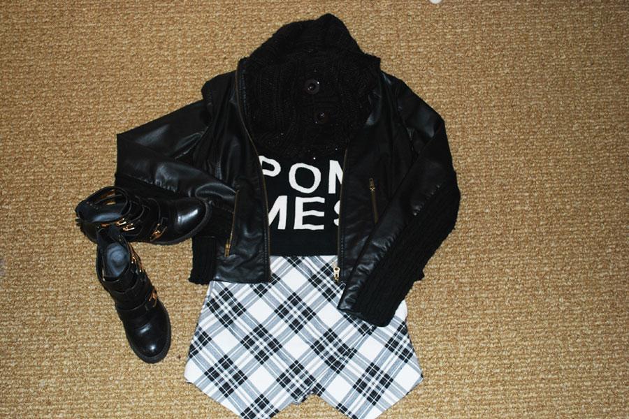 A leather jacket goes great with a plaid skirt and graphic T-shirt along with an infinity scarf to keep you warm and cozy. Add a pair of cute short boots to finish this outfit. 