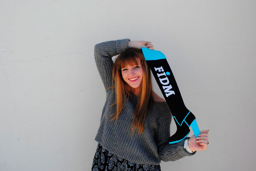 Maggie Barnes (11) strikes a pose to promote FIDM Fashion Club. She will be leading the club this year. 