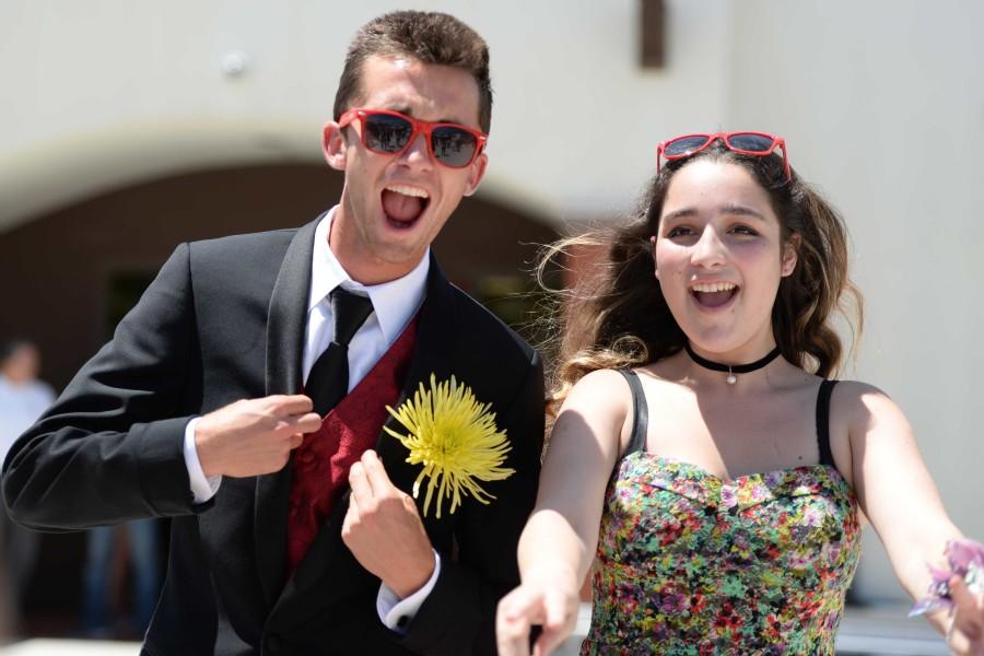 Ben HIll (12) and Brandi Ortiz (12) pose at the fashion show that was held on May 2nd with the help of Mens Wearhouse. 