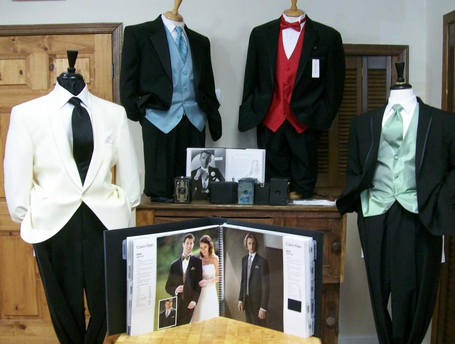 Set+of+tuxedos+lined+up+for+buyers.+Many+stores+have+prom+lay+outs+like+this+at+their+stores.