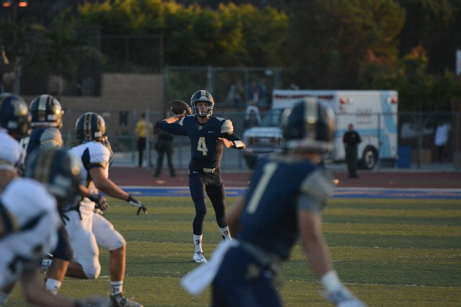 New Quarterback Doug Jackson (11) throws to Wide Receiver Cayden McCluskey (12) for the completion in the 36-29 victory against Dos Pueblos. The Stallions are now  2-0 in season and play tonight against Capo. Photo by Payton Hardin.