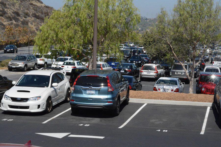 Construction over the summer lessened the parking space available to all SJHHS students. Recently built student parking lot still is unable to provide enough parking for students due to the construction still underway near the C and B buildings. Photo by Ethan Clarke