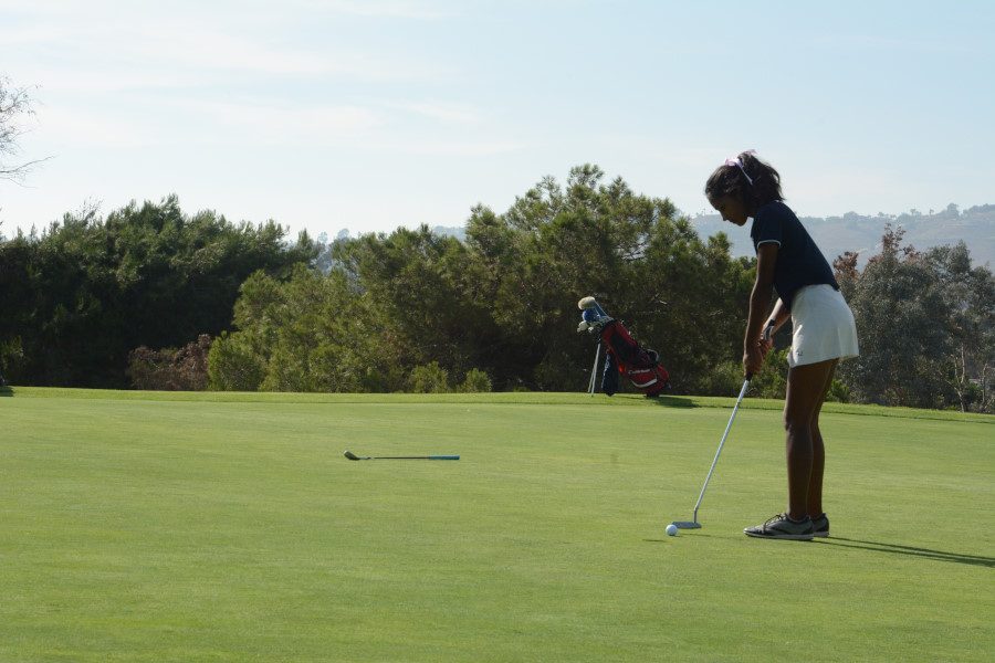 Senior captain Maya Kulkarni steps up to the tee for a close put.  After 2 days of league finals, only the top four girls continue to CIF on October 31.
