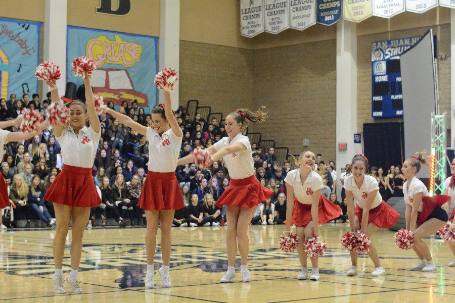 Cheerleaders round off the finishing touch of their dance during the Grease performance.