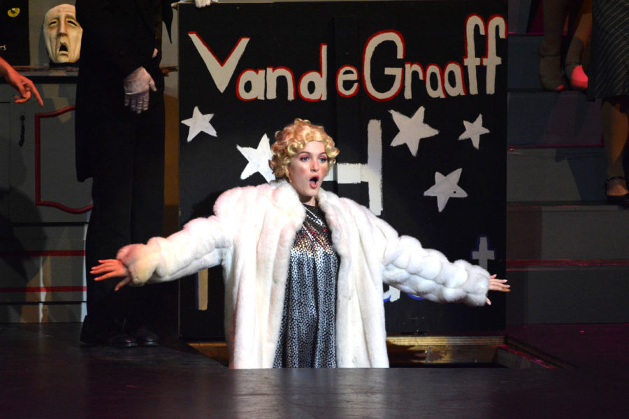Janet Vandegraff, played by Delaney Puthuff (11) gives a dramatic grand finale to her life in show business as she exits through the bottom of the stage. She plans to give up stardom to marry businessman Robert Martin. 