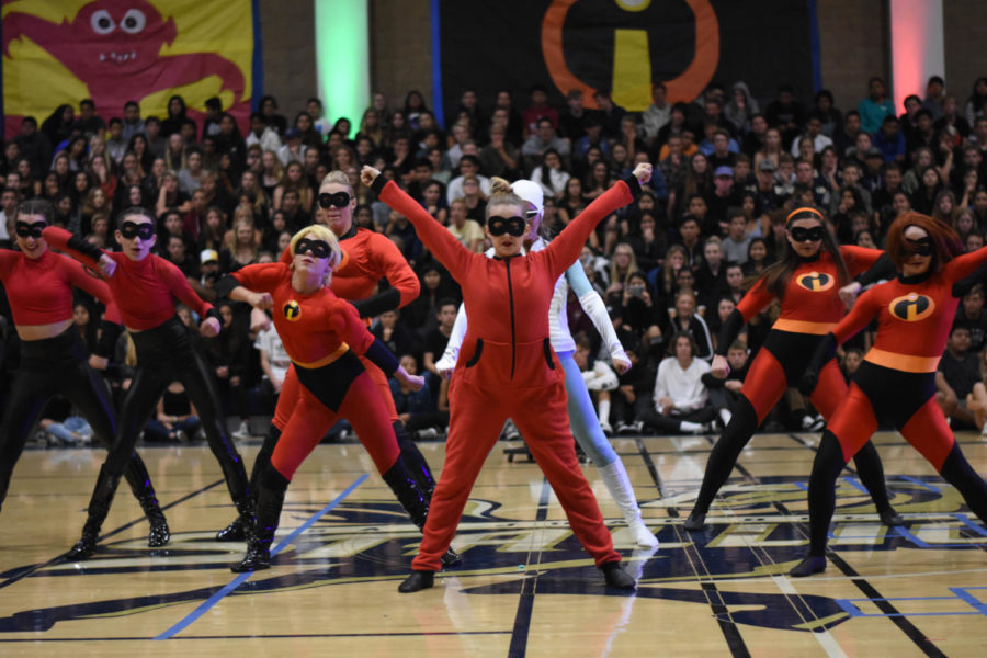 SJHHS’ dance program strikes a pose in their routine for the Homecoming Pep Rally of 2018. 