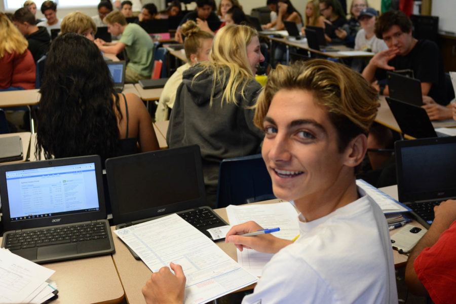 Some+eligible+SJHHS+students+register+to+vote+during+tutorial+on+October+2.+Keegan+Bengelsdorf+%2810%29%2C+smiles+while+filling+out+his+voter+pre-registration+form