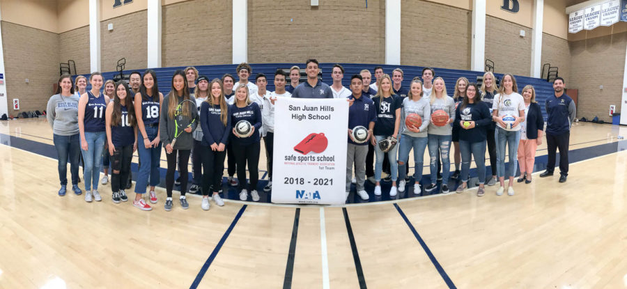Micah Ohlen gathers with Stallion athletes from volleyball, basketball, tennis, and more to celebrate San Juan Hills High school being awarded the Safe Sports School award.