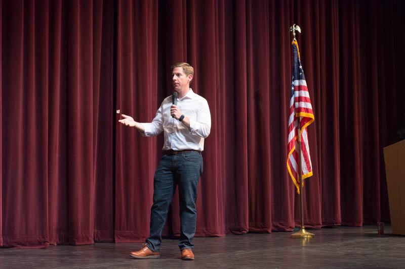 California representative, Mike Levin, looks out to the crowd as he answers questions. Some questions were asked by teenagers since the town hall was meant for students in high school. 