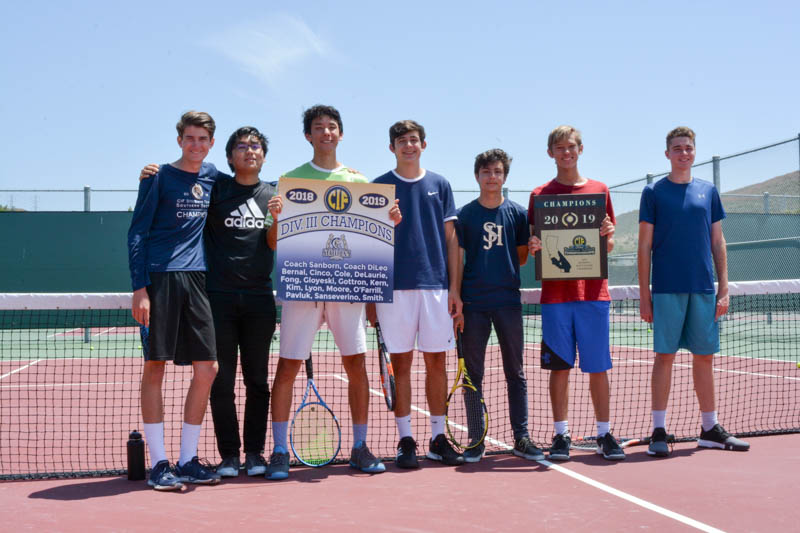 The varsity boys tennis team stands victorious with their CIF trophy. Pictured left to right: Ethan DeLaurie, Nathaniel Kim, Race Bernal, Julien Sanseverino, John Lyon, and Andrew Pavluk