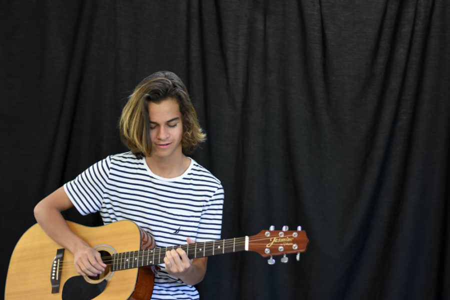 Jeremey Mitaux (11) is involved with music in many different ways as a guitarist, drummer, and most notably, a bassist for the band “White Collar”. He also writes music and lyrics to his own songs as an individual and has expressed interest in continuing his musical production after high school.
