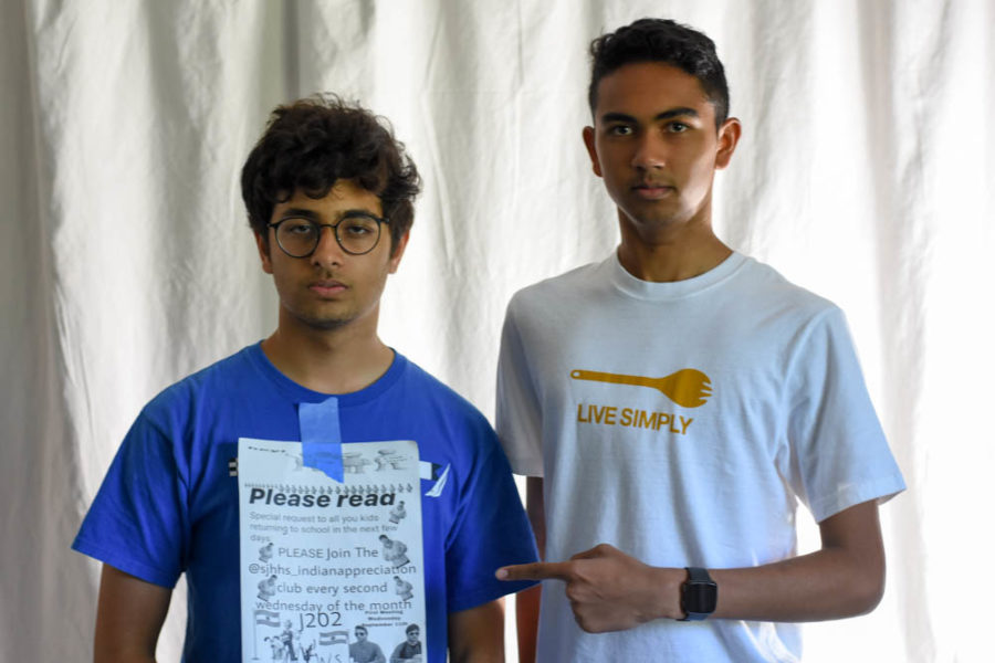  Kayden Kadri (11) and Sohum Joshi (11),  presidents, of the Indian Appreciation Club, pose with their poster promoting the Indian Appreciation Club’s first meeting. The club was created just this year in hopes to appreciate Indian culture.