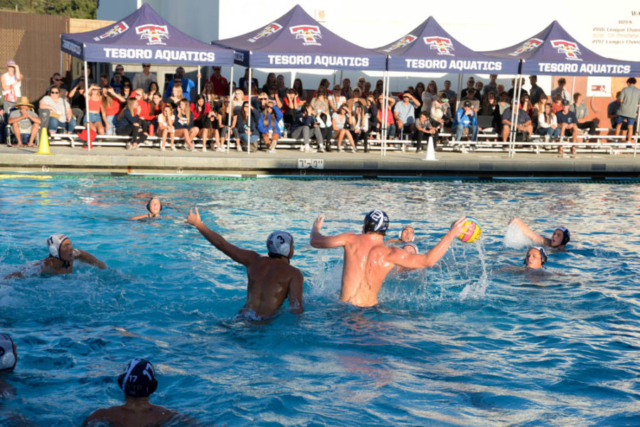 Max Miller (12) reaches back to score a goal for the Titan Takedown at the Gold Game against Tesoro on October 28th. Having scored 128 goals this season and 475 goals in total, players brace for impact at the infamous intensity of his shots.