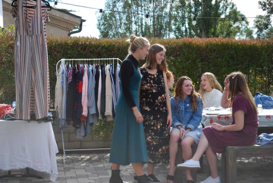 Dressember club members Corinne Hunnicut (12), Riley Goodfellow (12), Shayla Mauerman (12), Bella Mincer (12), and Ellie Rene (12) talk at a Dressember event to kick start the month. They wore dresses everyday in December to raise money and awareness for human trafficking. There was a dress swap and all participants had breakfast together. The club raised over $7,000 in 2019.