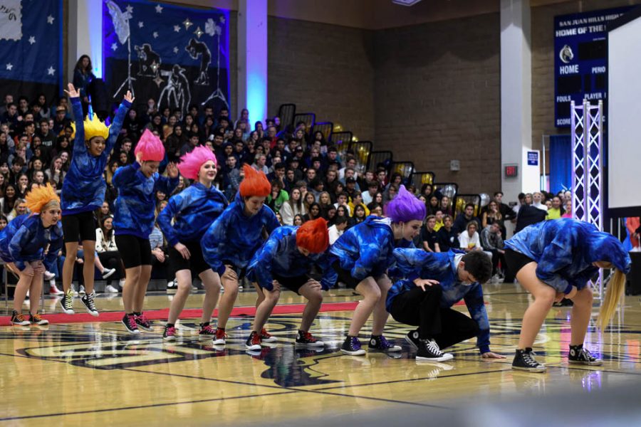 The Dance Production team collectively jumps up to the song “Hair Up” from the phenomenon, Trolls. The room flashed between colorful lights while the dancers continued to perform in sync.