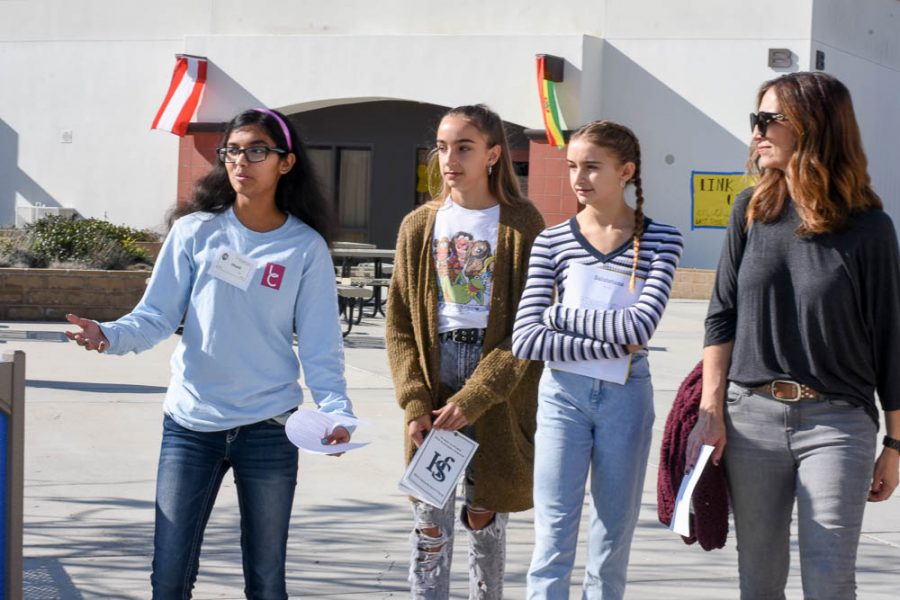 Link Crew leader Shali Patel (11) shows the incoming Stallions around the Upper Quad. In the upper quad, there were numerous booths demonstrating electives and clubs at San Juan Hills.
