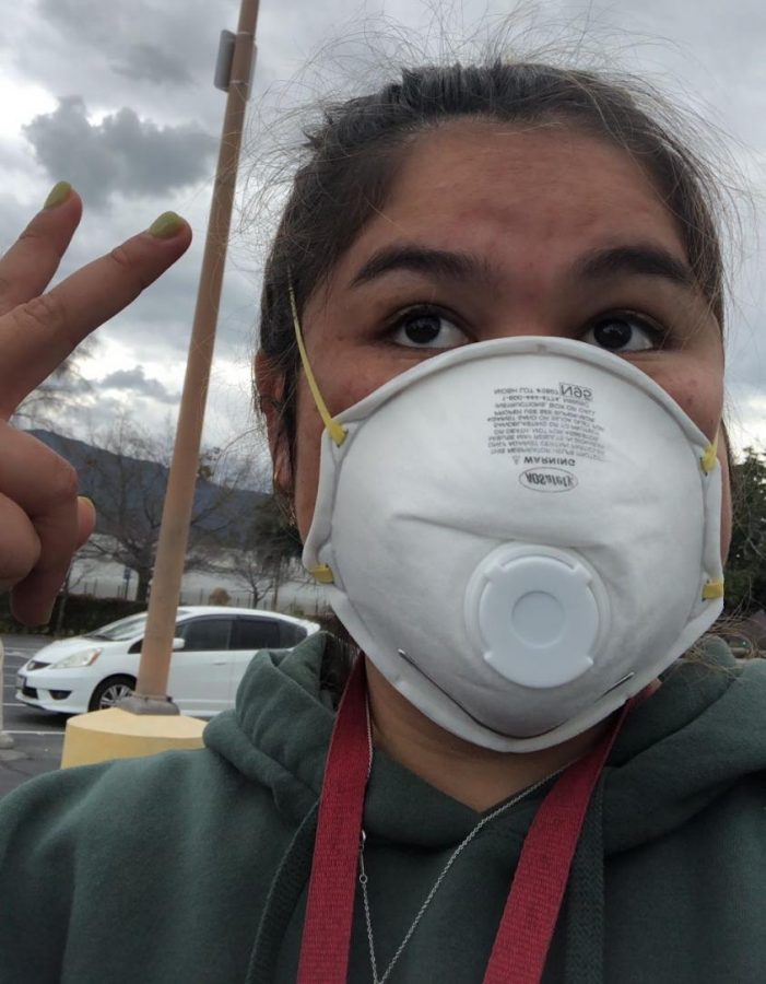 SJHHS alumni and current college sophomore Olivia Fu wears a mask soon after learning she contracted COVID-19. Due to a misleading label on her test results, she thought she had tested negative for the virus for three days before being informed that she was in fact positive.