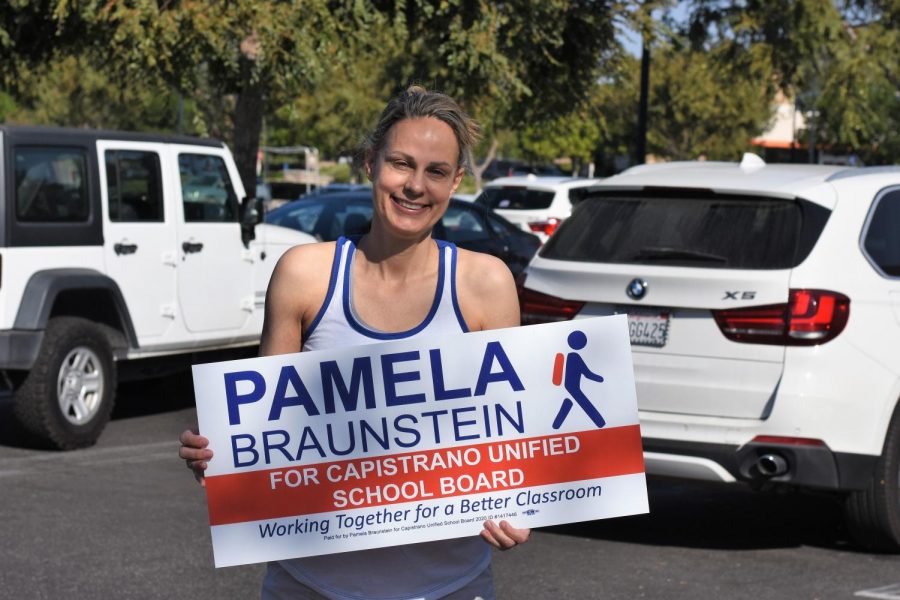 Pamela+Braunstein+poses+with+her+campaign+sign+at+a+campaign+event+in+Ladera+Ranch+this+past+weekend.+She+is+running+to+represent+Trustee+Area+Two+on+the+CUSD+Board+of+Trustees%2C+which+includes+Ladera+Ranch%2C+Rancho+Mission+Viejo%2C+Coto+de+Caza%2C+Las+Flores%2C+and+parts+of+San+Juan+Capistrano.+The+seat+is+currently+held+by+Trustee+president%2C+Jim+Reardon%2C+but+Braunstein+is+hopeful+that+she+can+win.