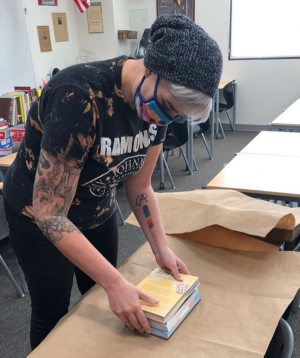 English teacher and queer alliance advisor creates the LGBTQ+ care packages with several titles surrounding different aspects of queer experiences.
