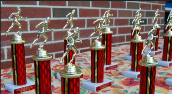 This image depicts trophies that are often a physical representation of attendance achievements. These create an exclusive nature around perfect attendance, causing a toxic school culture going into high school and beyond.