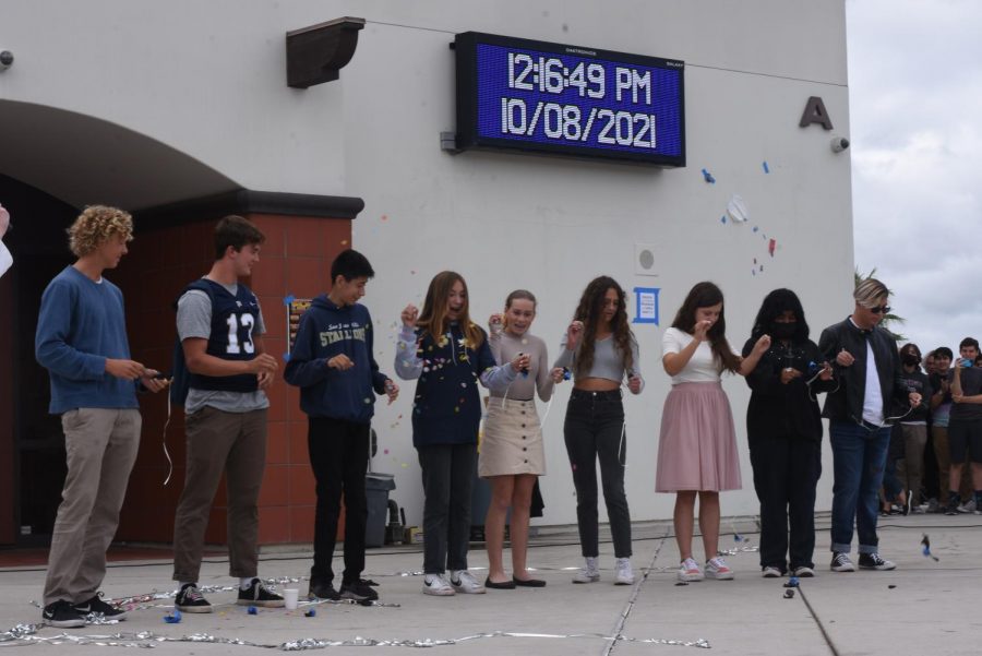 Freshmen+homecoming+court+nominees+each+pop+balloons+that+reveal+who+has+been+named+homecoming+princess+and+prince.+Ava+Crozier+and+Weston+Port+won+the+coveted+freshmen+crowns.