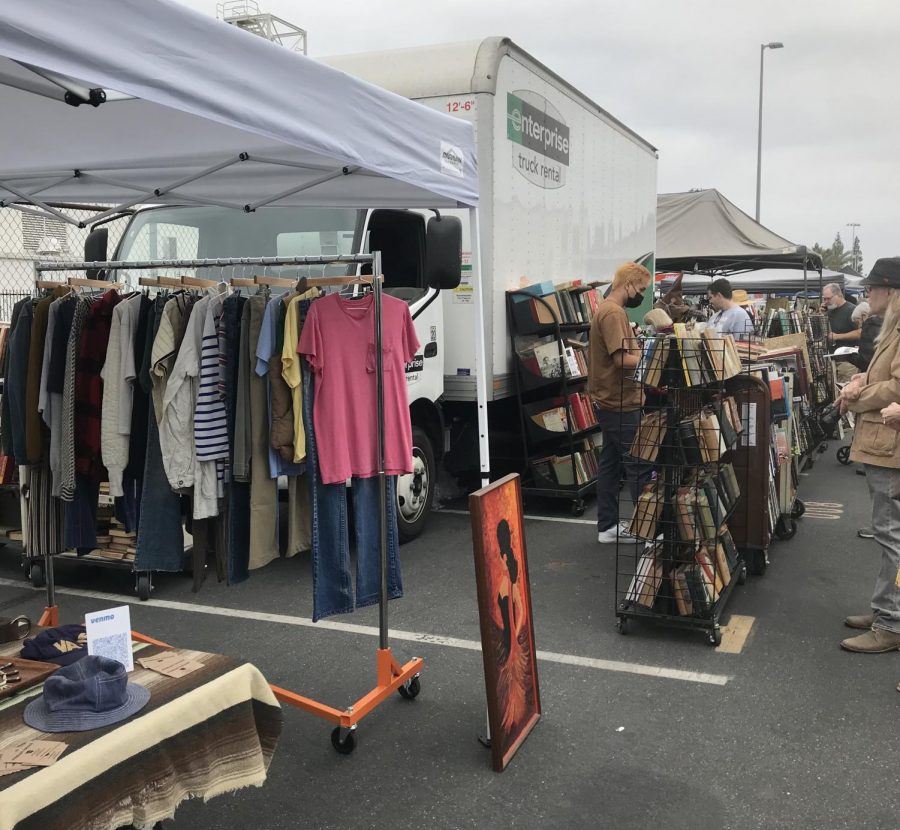 The Long Beach Antique Market gathers hundreds of shoppers at their most recent pop-up on Halloween morning. The holiday did little to lessen the amount of visitors, where vendors supplied a surplus of books, clothes, decor, and many other trinkets. 