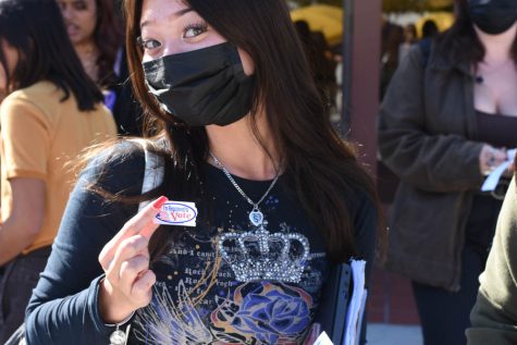 Shannon Pho (12) debuts her “I Registered to Vote” sticker after filling out the forms and paperwork necessary. Anyone over the age of 16 can pre-register, and they will be automatically registered to vote in the first election after they turn 18.