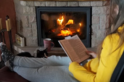 POV: A camera pans to you sitting at the fireplace, reading a book recommended by your English teacher.