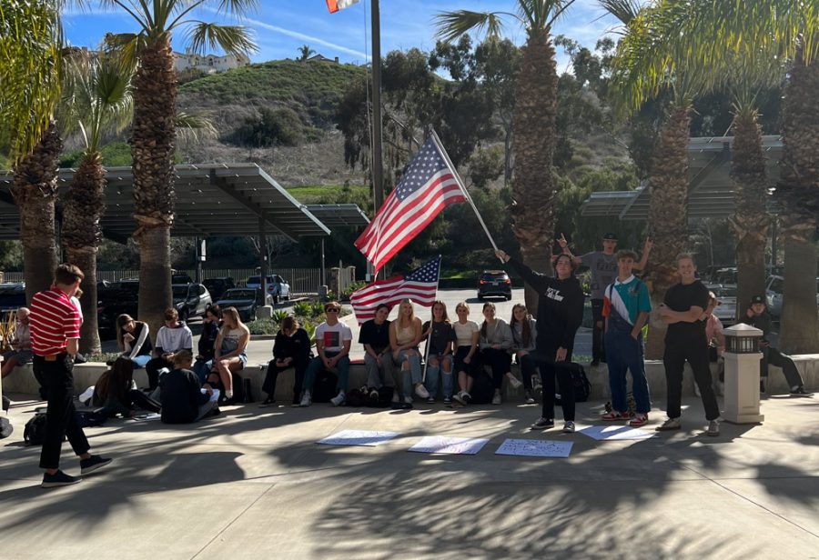 Students who left campus after declining to wear a mask gather at the CUSD District Office to protest the mask mandate.