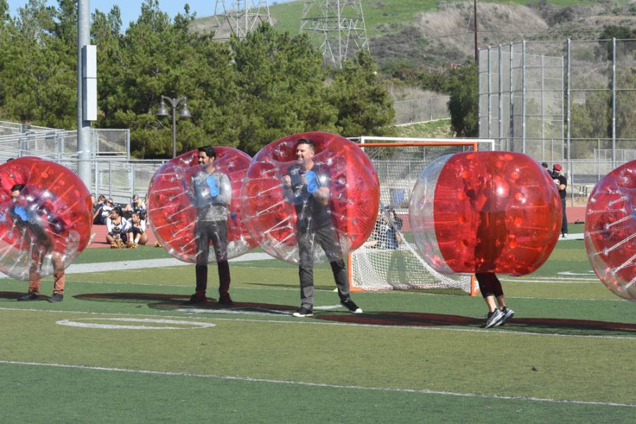Apart from the display of different student showcases, teachers got in on the fun with a game of soccer wearing inflatable bubbles. Dr. Mahindrakar and Mr. Lynde were a few of the brave staff to participate in the festivities, battling each other to stay standing and score.