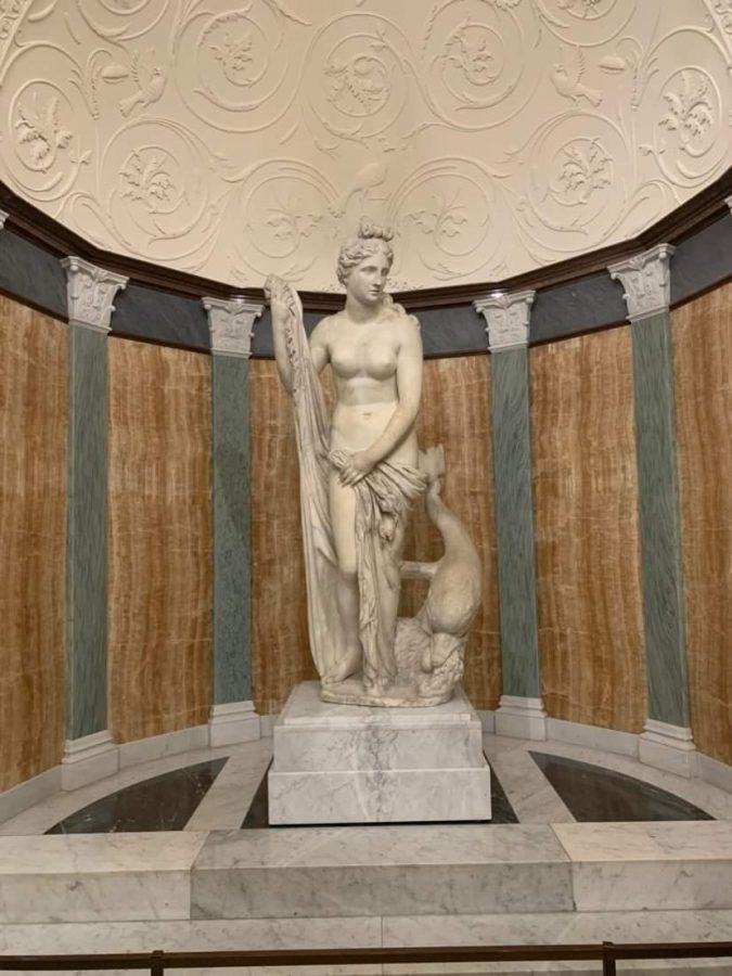 “Statue of Venus” is  located in the private basilica within the Villa This marble sculpture depicts Venus holding cloth around herself. She is accompanied by the image of a dolphin, symbolizing romance and referencing the goddess’s birth from the sea.