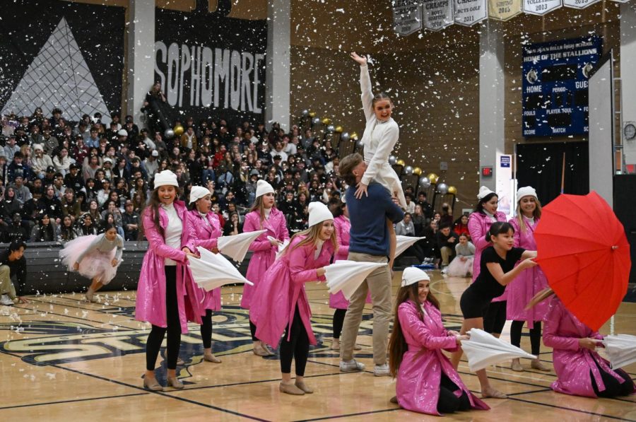 For+the+Winter+Formal+Pep+Rally%2C+dance+coach+Kristine+Calder%E2%80%99s+interpretation+of+the+theme+%E2%80%9CWinter+in+Paris%E2%80%9D+followed+the+story+of+a+girl+who+gets+stood+up+at+the+altar+and+goes+on+a+solo+honeymoon+trip+to+Paris+with+the+help+of+her+friends.+After+the+opera+ballet%2C+the+girl+meets+someone+in+the+park+and+the+two+instantly+fall+in+love.+Sparks+fly+between+the+two+characters+as+%E2%80%9Csnow%E2%80%9D+falls+in+the+air+around+them%2C+bringing+the+production+to+a+close.