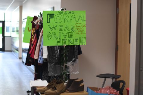 Outside of room J105, the Sponsor a Stallion club ran a Winter Formal Dress Drive where students were able to donate any kind of formal attire, including dresses, suits, shoes, makeup - all of which are gender inclusive. These donations could be picked up free of cost by any student. Sponsor a Stallion acknowledged the ongoing issue of high expenses spent on school dances, so they aimed to help out students in need of financial support. 