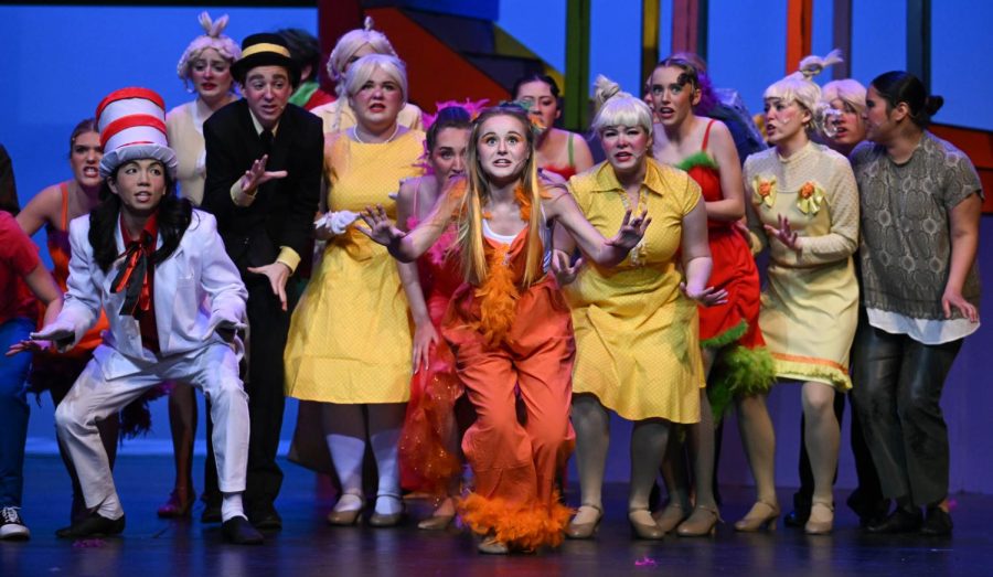  Lisa Gnielinski (11) plays Gertrude the one-feather bird (center), she leads the cast of “Seussical” downstage as they all sing, “Oh, the Thinks You Can Think”. Nathaniel Chin (12) plays the Cat in the Hat (Left).