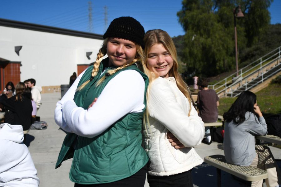Monika Degree (11) and Kristina Degree (9) participate in Friday’s dress-up day “Snow Day by bundling up for the winter season and wearing puffer vests and beanies.