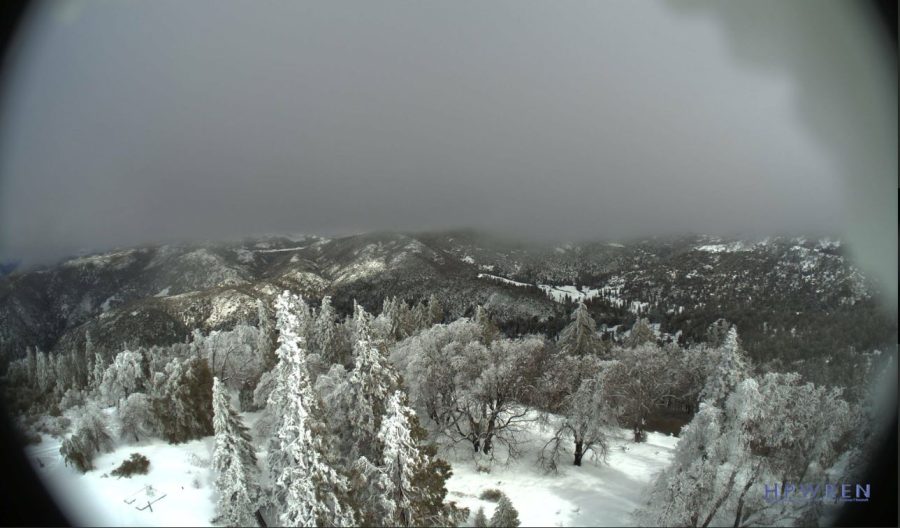 Looking north towards Orange County, a webcam captures the wintery landscape from atop Palomar Mountain in east San Diego County. The camera is placed at Boucher Hill, an active fire lookout during the fire season.