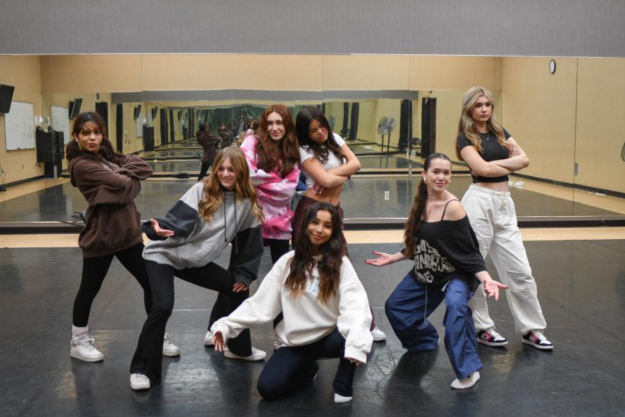 Dancers Kate Hoskin (10), Renne Trice (10), Maggie Flores (10), Grace Ober (10), Alexa Delgado (10), Evelyn Velazquez (11), and Olivia Carrillo (11) practice for the upcoming showcase. Their dance tells the story of a robbery.
