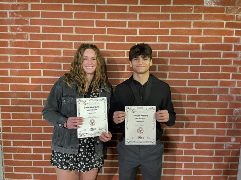 Bridget Miller (12) and Jake Topartzer (12) smile as they receive the OCADA “Athletes of Character” award. The varsity athletes have demonstrated their leadership skills both on and off campus. 