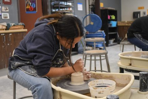 Jessica Garcia (11) throws a pot in ceramics class. Activities like this are made possible by the success of the ceramics fundraiser.