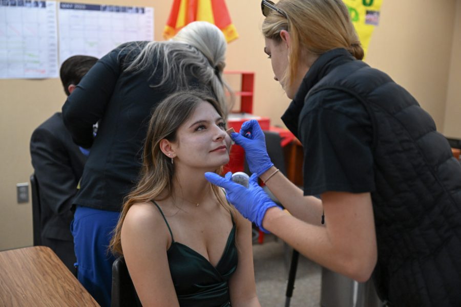 Behind the scenes of Every 15 Minutes, Lily Esparza (12) is getting her makeup done to appear as though she was in a gruesome car accident. As the designated victim who is dead on arrival, she is given several gashes all throughout her face and limbs. 