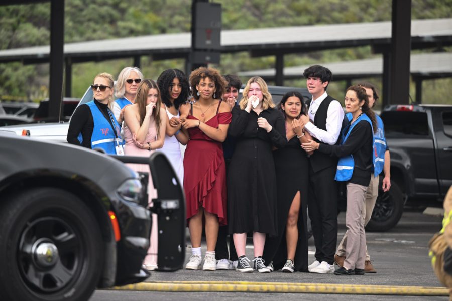 Minutes after the crash, a group of nearby students rush to the scene to see what
had occurred. The students were also on their way to prom, but quickly became
bystanders on the crash scene. After witnessing the injuries and deaths of their
friends, who were victims of the crash, the students broke down and stood on the side
of the scene, comforted by TIP (Trauma Intervention Programs) volunteers.