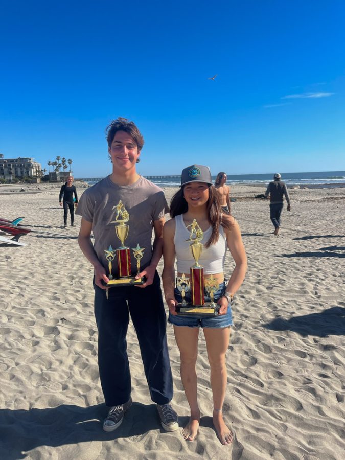 Matt Chance and Gwyenth Lyon stand proud holding their trophies they received after winning 4th place in the Women’s Shortboard and 6th place in the Men’s Longboard. Along with Chance and Lyon, the team won the Men’s Shortboard, Women’s Shortboard, and Women’s Longboard titles.