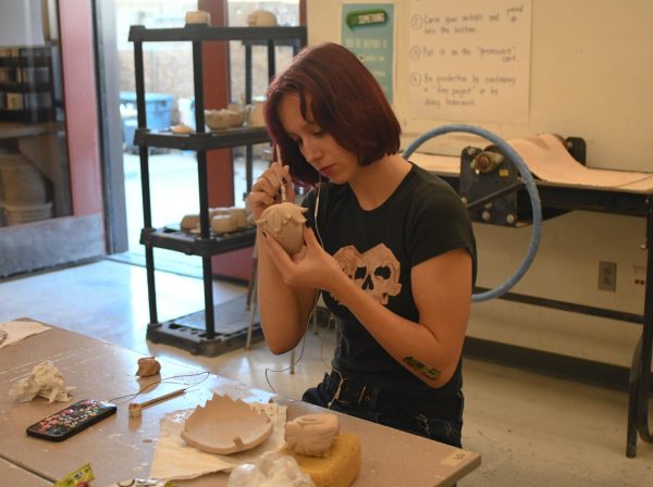  Because of new funding provided by Prop 28, more students like Talyn Hardy (12) have an opportunity to take ceramics classes. After only starting ceramics this year,  Hardy has already had many opportunities to express herself creatively. “I just like that you can make things that are tangible,” said Hardy.