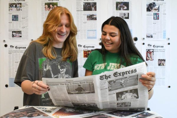Proudly looking through past print editions, Co Editors-In-Chiefs Celeste Cariker (12) and Claire Stafford (11) remark on the various milestones The Express has surpassed in the last thirteen years. “I will say that student journalism is extremely underrepresented right now, and I think that we need a lot more school involvement in it,” said Stafford. Cariker and Stafford plan on reviving The Express’ relevancy this year through more frequent print editions and through social media. 
